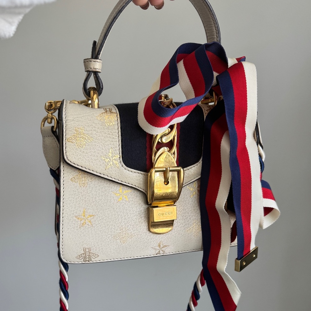 Gucci Web Sylvie Crossbody Bag with Striped Strap, bow and leather strep
